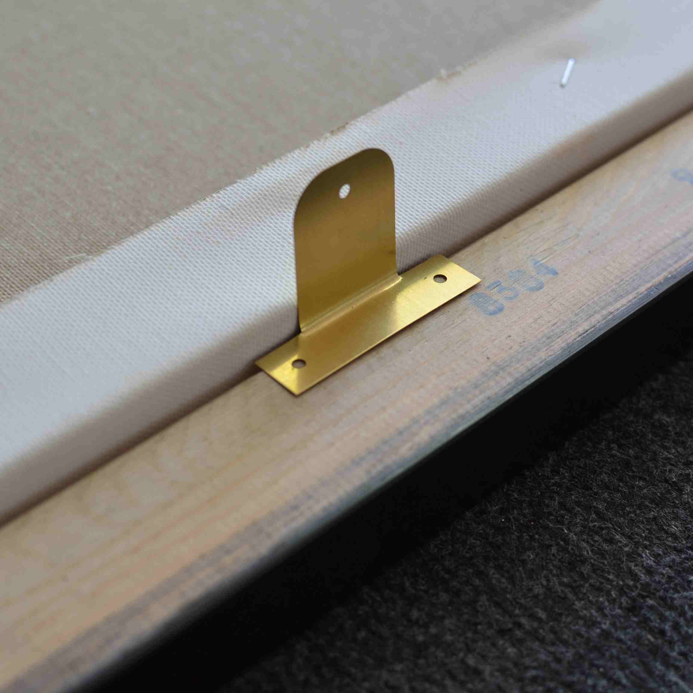 Securing the artwork and mounting the hangers