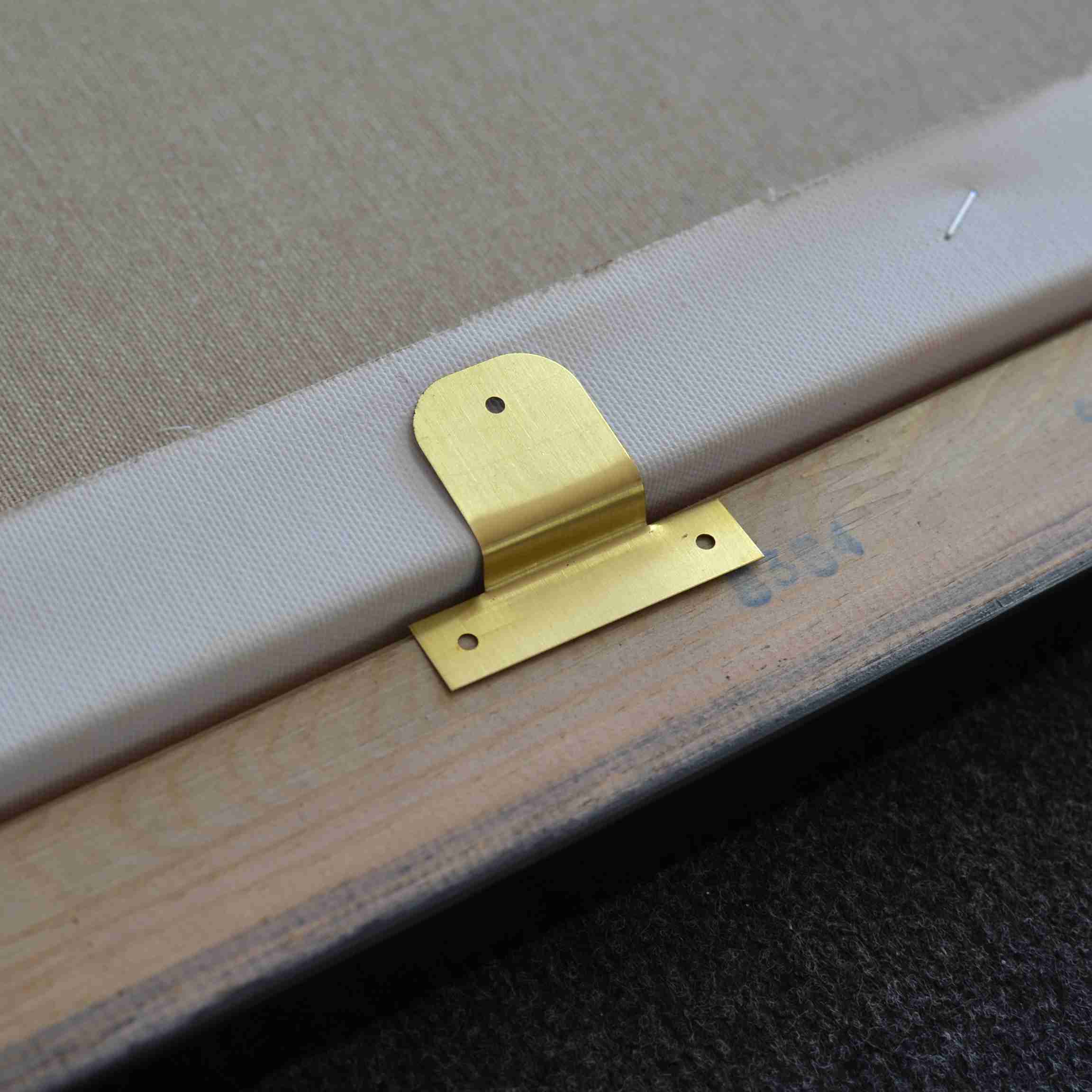 Securing the artwork and mounting the hangers